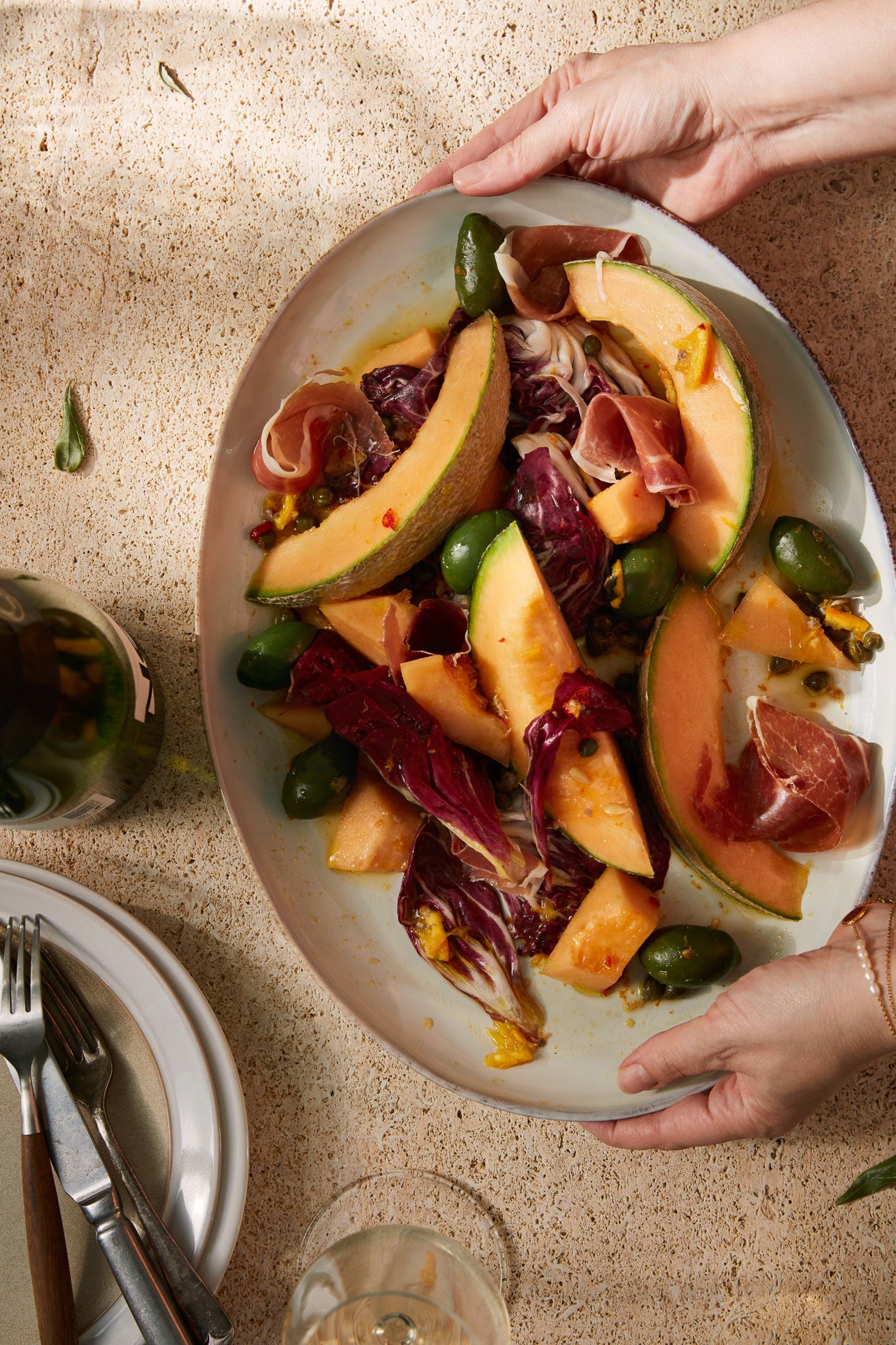 Melon and ham with radicchio and castelvetrano