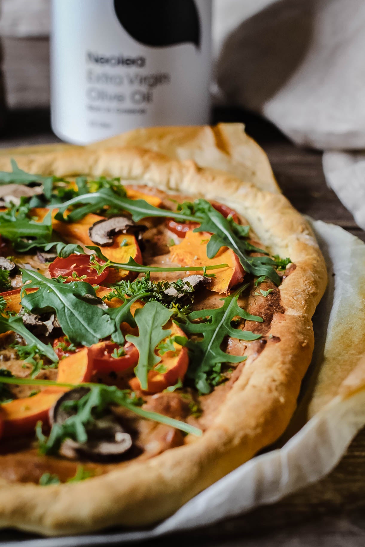Tarte flambée with thyme, pumpkin and walnut-ricotta pesto