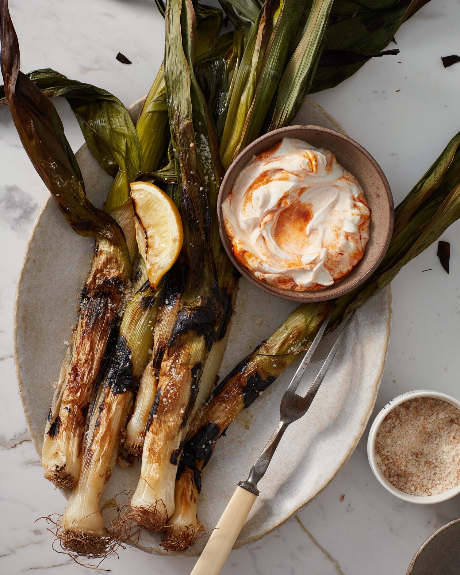 Charred leeks with Citrus Sea Salt and harissa yoghurt